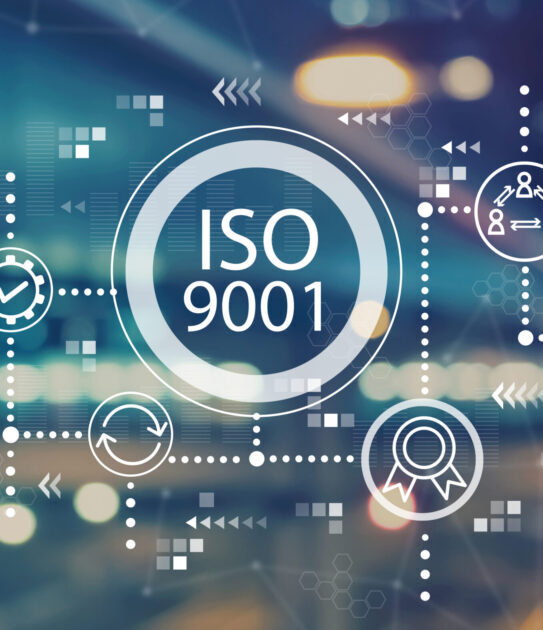 ISO 9001 with blurred city lights ISO 9001 with blurred city abstract lights background